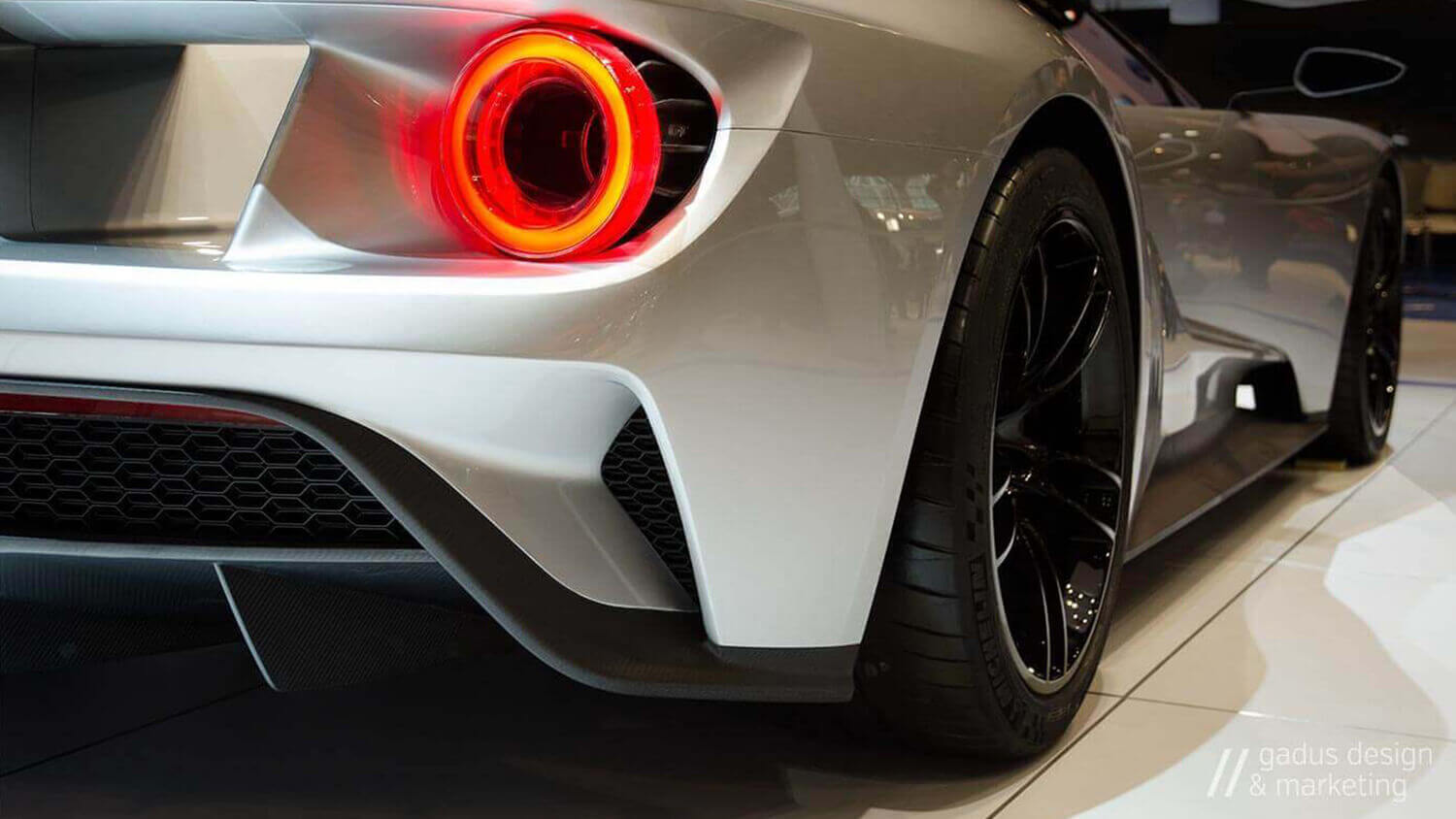 A close up image of the tail lights on a 2016 Ford GT.