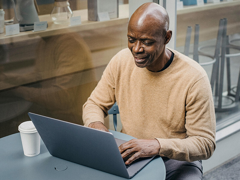 An image of James using MeetApp on his computer.‎