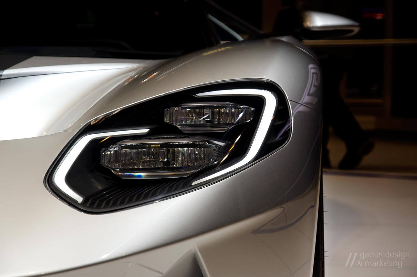 A photograph of the headlight on a 2017 Ford GT, taken by Jennifer Gadus