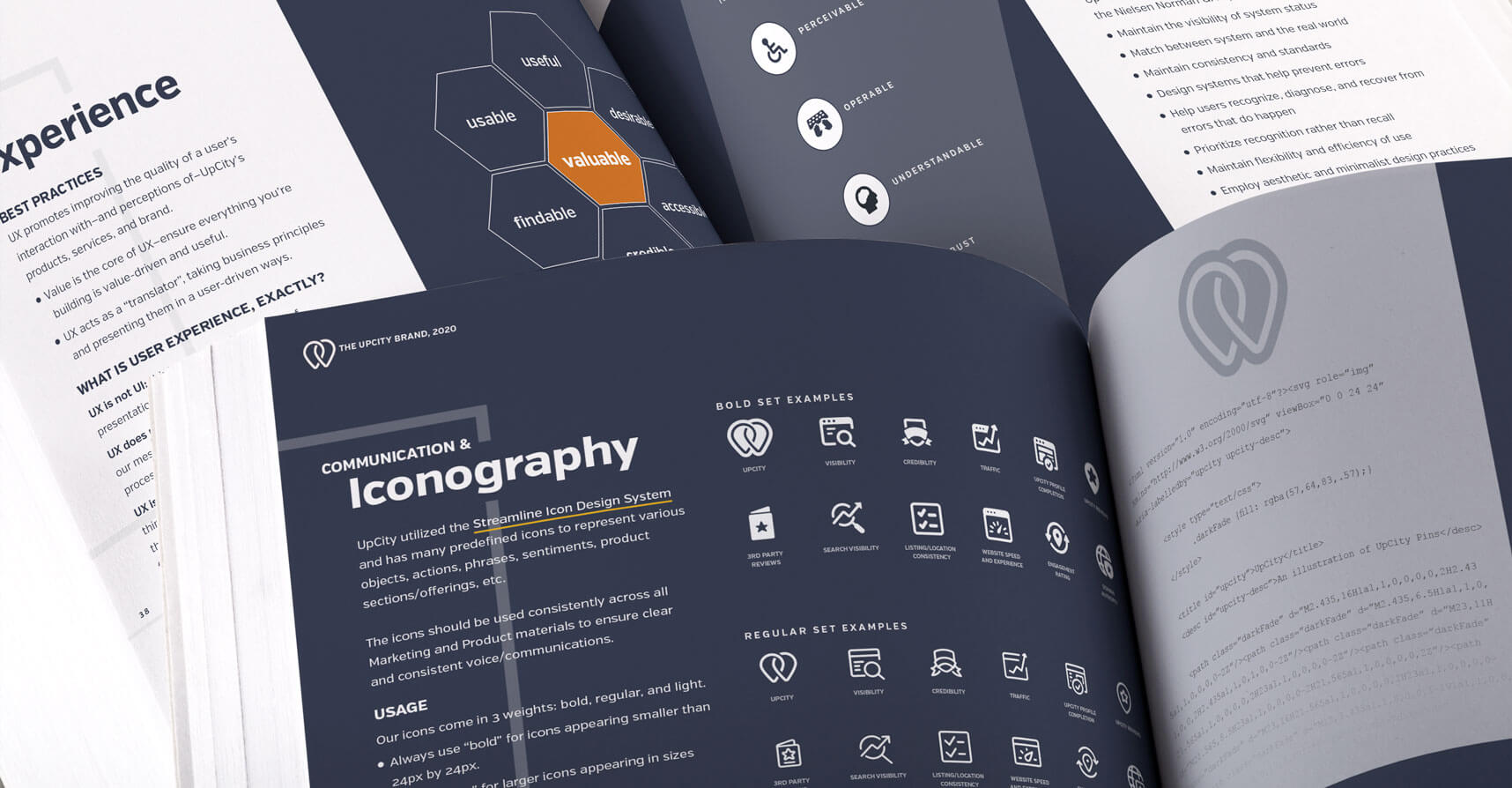 A mockup of the UpCity brand booket showing the final typographic selection by Jennifer Gadus.